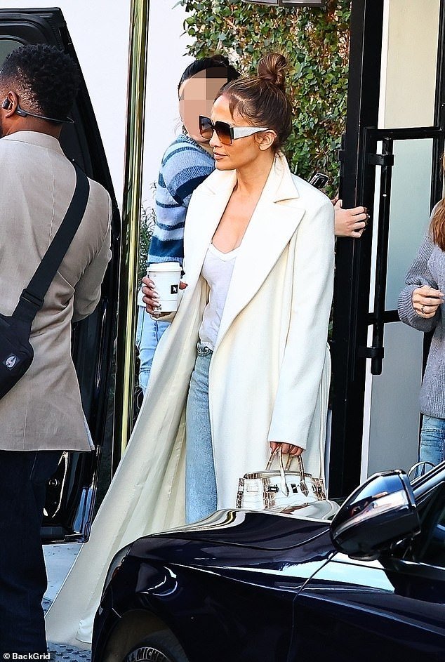 Jennifer Lopez shops for gifts with family on Rodeo Drive ahead of Christmas without Ben Affleck