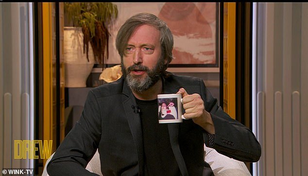 'I found this mug in my garage a couple of years ago and I just kind of kept it because I figured someday I might be on your TV show and it¿d be fun to have a sip out of your mug,' Tom said.