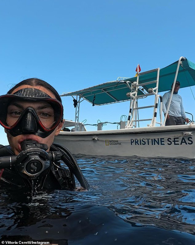 She also shared photos of herself gearing up to go scuba diving