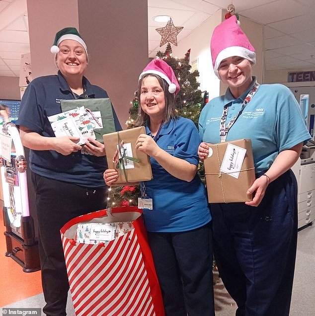 The charity also shared photos of nurses in colored Santa hats distributing the brown and green wrapped gifts adorned with festive string bows and a card that read 'Happy Holiday'