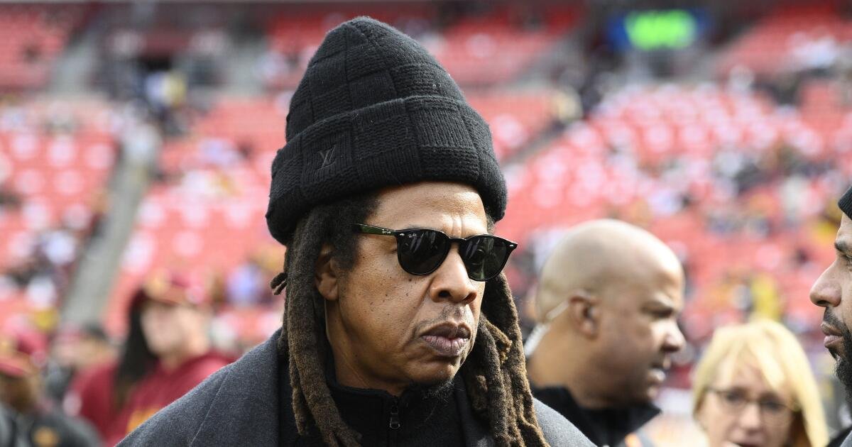 NFL stands by Jay-Z after woman accuses him of rape when she was 13