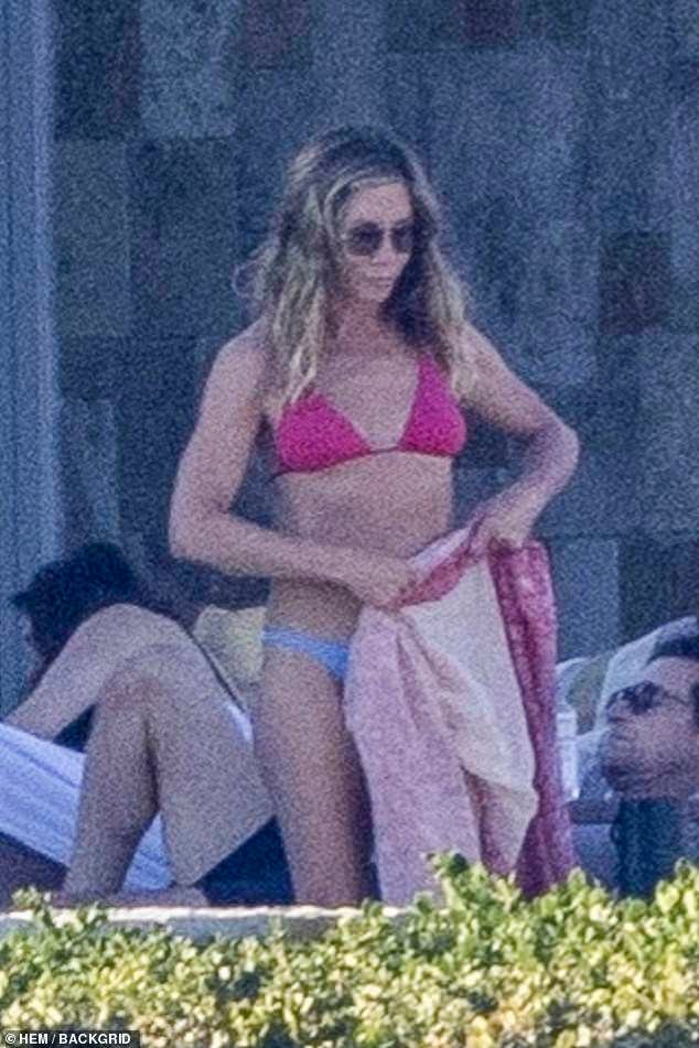 Aniston had her chiseled body on full display Thursday as they bikini-clad babe hung out by the pool with her close pal Jason Bateman, 55