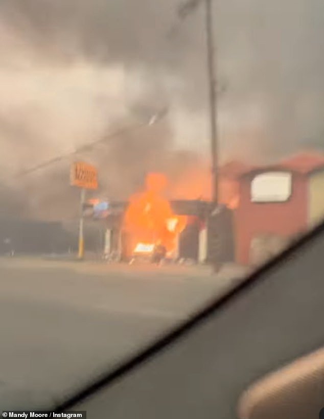 The This Is Us star shared a video of her driving through city streets surrounded by smoke and fire