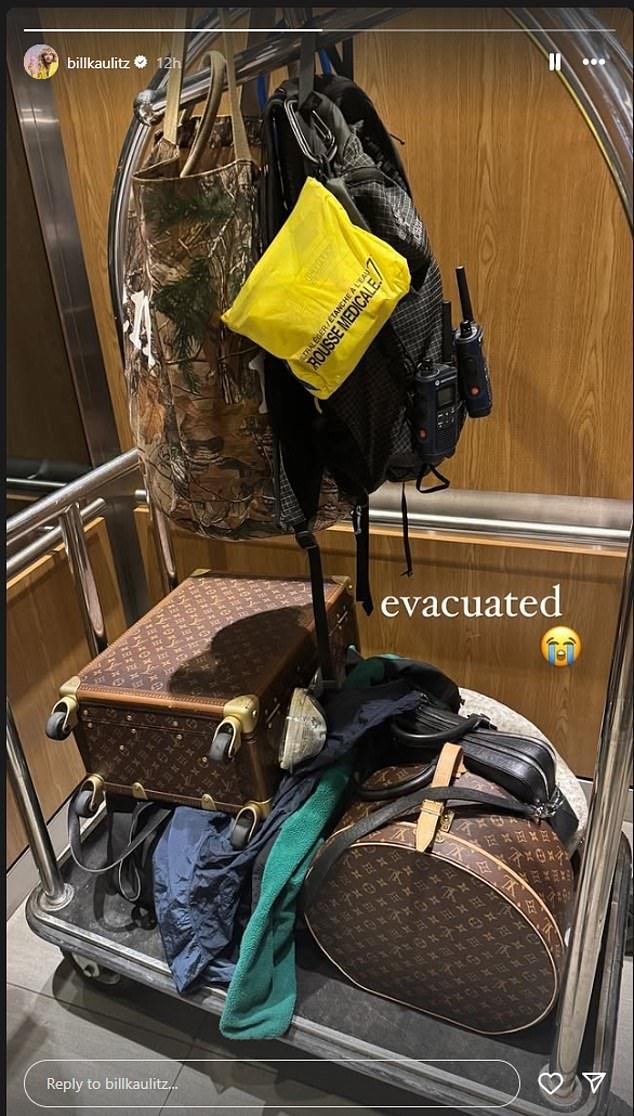 Showing a snap of his packed luxury suitcases, a Red Cross emergency kit and two walkie-talkies on a cart, he wrote: 'Evacuated'