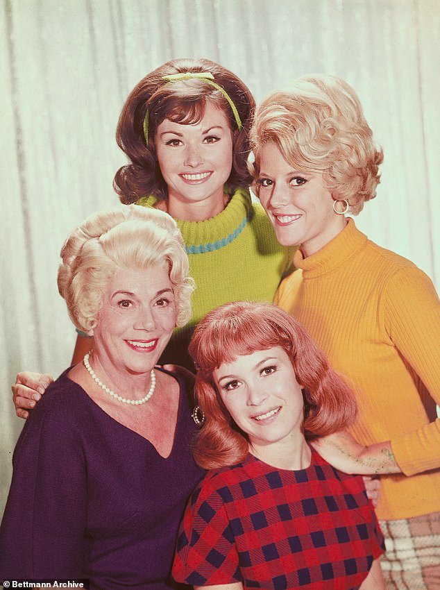 Henning was one of only three cast members to stay throughout the entire run, appearing in 219 of the 222 episodes; (Standing are Lori Saunders and Meredith McRae, while seated are Kate Bradley and Linda Henning)