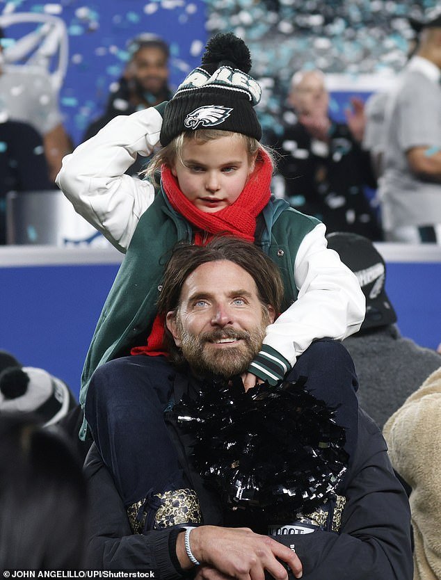 Bradley Cooper celebrates with daughter Lea as his beloved Philadelphia Eagles head to Super Bowl