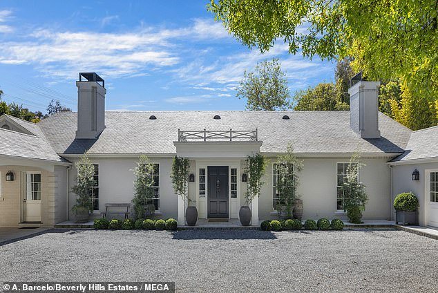 The Oscar-winner's former home features a guest house complete with a movie theater and wine cellar, and is located in in LA's Brentwood neighborhood