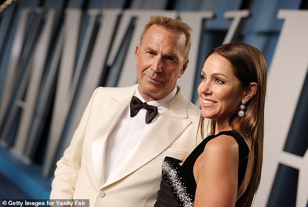 The Yellowstone star, 70, and Baumgartner, 50, split in May 2023 following a 19 year marriage and three children - with Baumgartner sparking up a romance with the handsome financier, 49, that year - pictured at the Vanity Fair Oscar Party in 2022