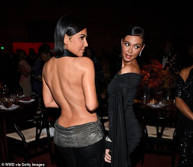 Kim showcased her toned back as she posed for photos