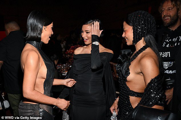 Kim looked in good spirits as she chatted to Kristen Noel Crawley and Sami Miro