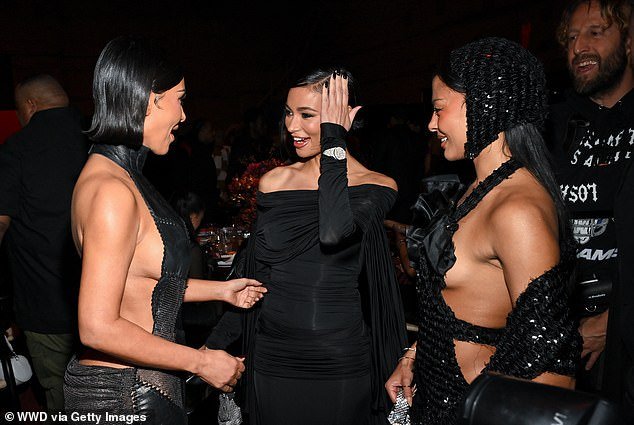 Kim looked in good spirits as she chatted to Kristen Noel Crawley and Sami Miro