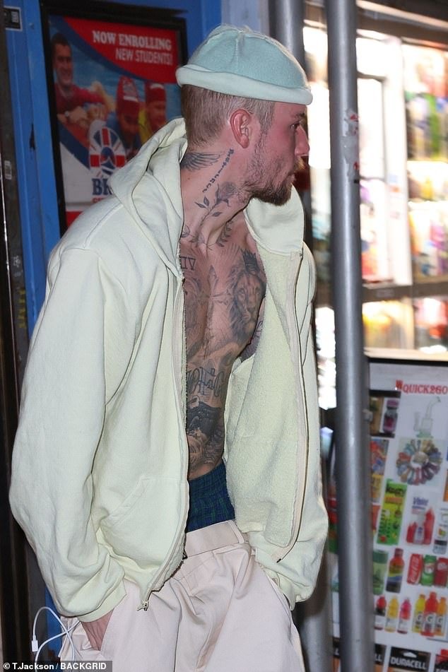 Justin Bieber exposes tattoo with heartbreaking message on solo visit to NYC bath house amid Hailey ‘marriage crisis’