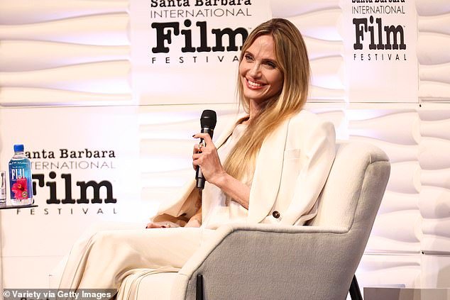 Jolie flashed a huge smile while speaking on stage