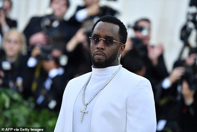 Sean 'Diddy' Combs (pictured 2018 in NYC) has been sued by a man who said the rapper drugged him and sexually assaulted him at a Southern California nightclub in 2015, effectively ending his career in the music industry