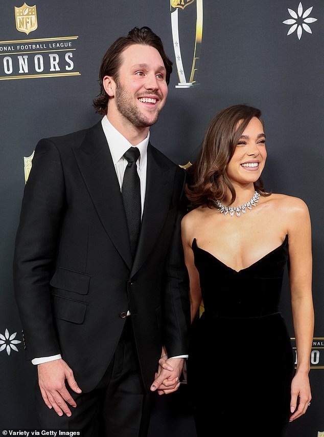 The Marvel actress stunned in a strapless, low-cut black gown for the footballing occasion