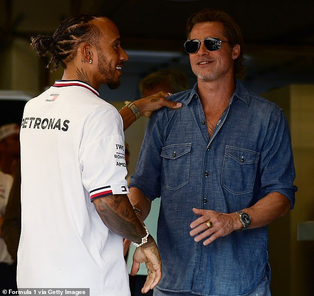 Lewis Hamilton of Great Britain meets Pitt in the garage prior to the F1 Grand Prix of USA at Circuit of The Americas in 2022 in Austin, Texas