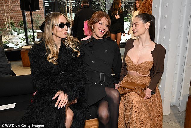 The siren was far right as she sat with Harley Viera-Newton and Ivy Getty