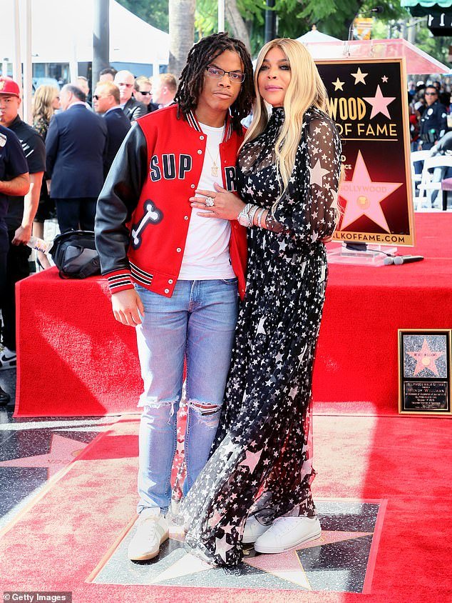 Williams also revealed to TMZ that she will see her son Kevin Hunter Jr. (pictured with her in 2019 in Hollywood) when she's allowed to travel to Miami over the weekend for her father's 94th birthday