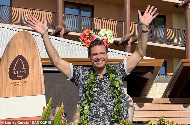 Seacrest, 50, was also seen on-site posing in Hawaii-themed Mickey ears