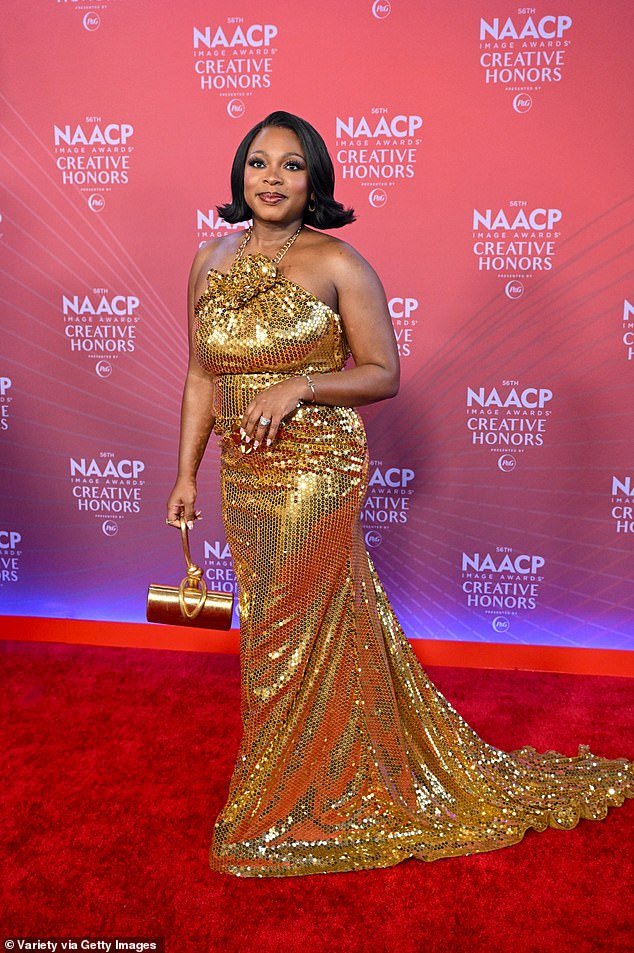 Naturi Naughton wowed in a gold sequin, halter-top gown that hugged her curves and glittered in the night