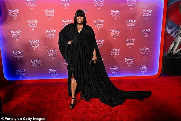 Natasha Rothwell wowed in a lowcut black velvet gown with a sexy leg slit and stunning train