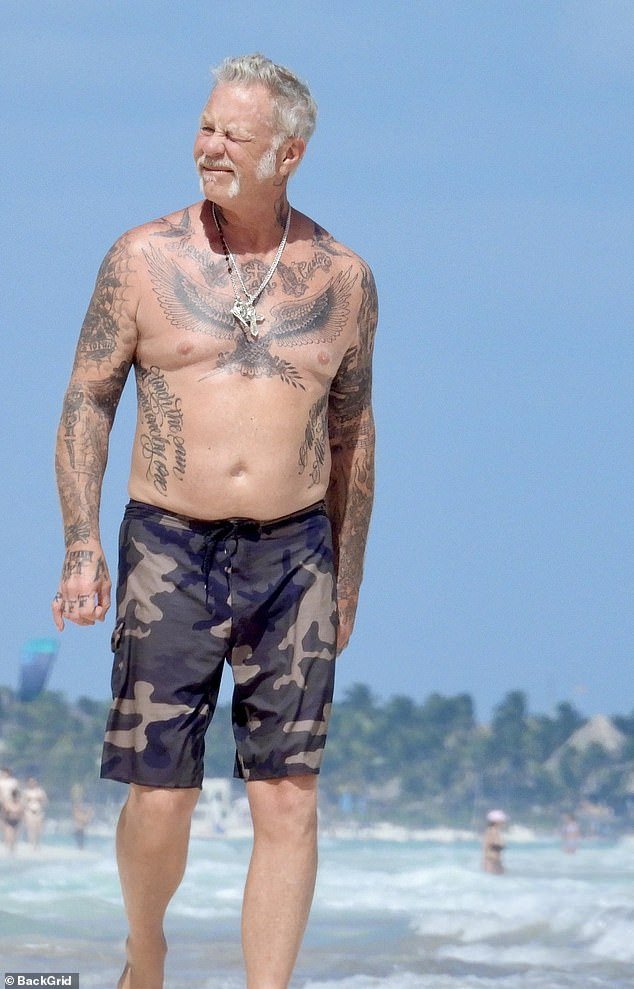 Hetfield was also seen checking out his girlfriend on numerous occasions as she rocked a black string bikini