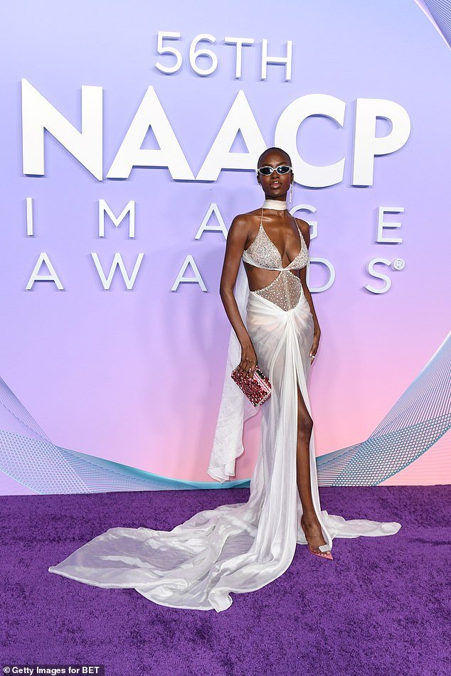 Madisin Rian looked incredible in an ethereal white gown with sheer panels