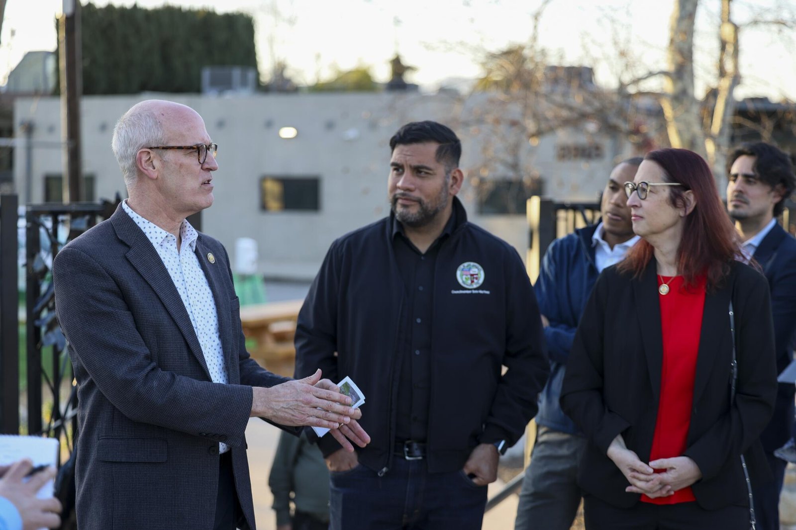 Rep. Rick Larsen, City Councilmember Hugo Soto-Martinez and Rep. Laura Friedman hear remarks.