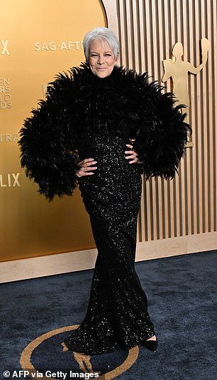 Jamie Lee Curtis stood out in a feathered long-sleeved black sequin gown