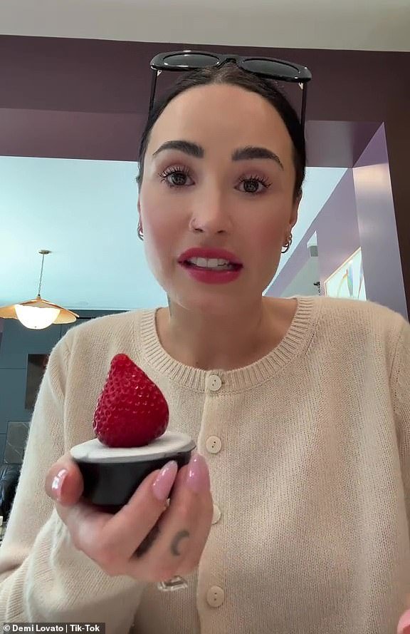 Demi Lovato slammed for wasting  on a single strawberry from Erewhon